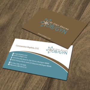 Modern but classy OBGYN needs a business card and letter head | Business Card Design by Dezero
