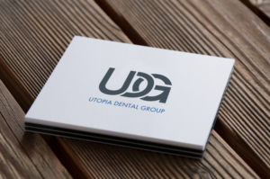 Design de Logo par codeuridea pour Utopia Dental group | Design #7699536