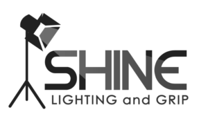 Shine (in large letters) - Lighting and Grip (in small letters as a description). And 