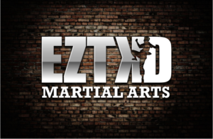 Logo-Design von volebaba für EZTKD Martial Arts | Design: #10132364