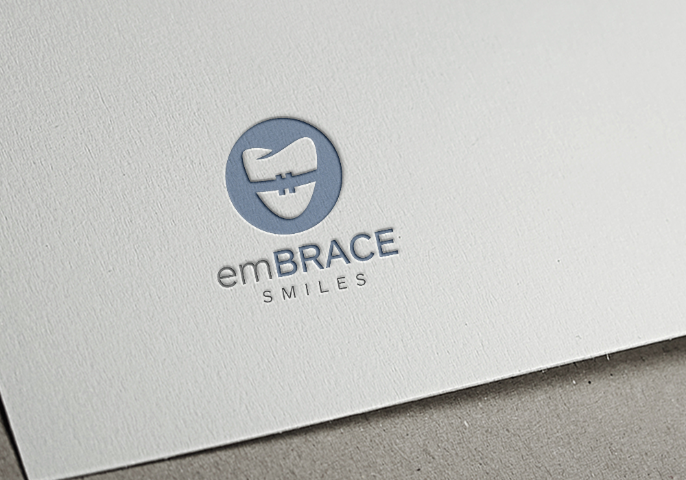 Design de Logo par gudeveleven pour Embrace Smiles | Design #12627992