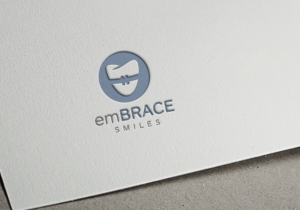 Logo Design by gudeveleven for Embrace Smiles | Design: #12627992
