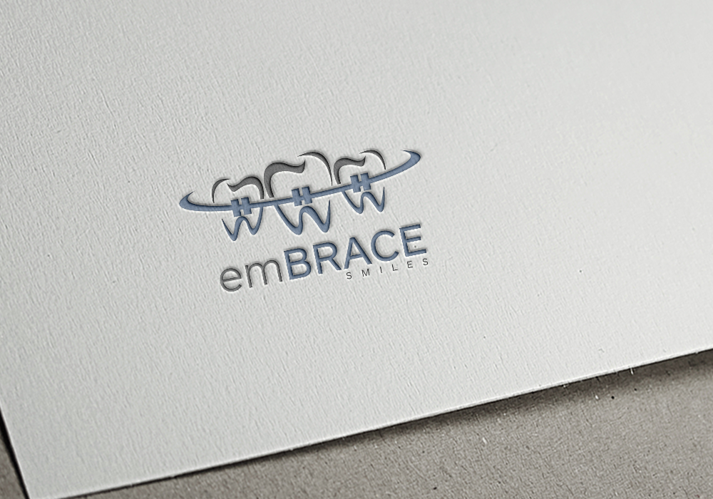 Design de Logo par gudeveleven pour Embrace Smiles | Design #12627993