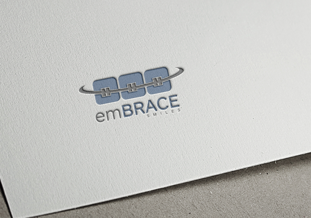 Design de Logo par gudeveleven pour Embrace Smiles | Design #12627994
