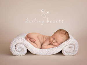 Diseño de Logo por RL Designs para Darling Hearts Newborn and Baby Portraiture  | Diseño: #13434687
