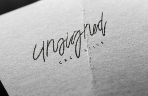 Unsigned Creative | Logo Design by GLDesigns