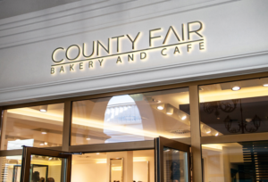 Diseño de Logo por imshohaghossain85 para County Fair Bakery and Cafe | Diseño: #16185367