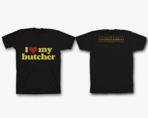 black t shirt with graphics on front to read 