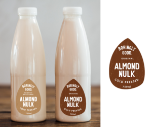 Our Almond Nulk needs new labels and logo as good as the product itself - the ultimate nut milk | Design Emballage par Bittersweet