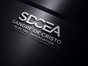 Sangre de Cristo Electric Association.  We would also like a version of the logo that says just SDCEA instead of the full company name, with the full company name integrated below the design. Ideally, we’d be able to pair the logo with other aspects of our business, such as charitable giving, an anniversary observation, etc.. We would like to see versions with and without the tagline -   Tagline option 1: South Central Colorado’s Community Electric Cooperative Tagline option 2: Your Community Electric Cooperative | Logo Design by Atec
