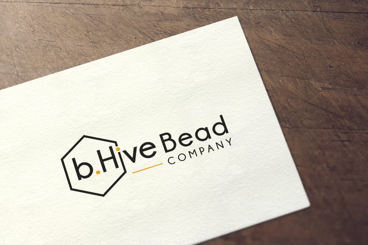 Diseño de Logo por CreativeBaba para b.Hive Bead Company | Diseño #22645787