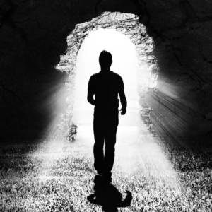 A person walking out of the dark and into the light  | T-shirt Design by Abiyoso28
