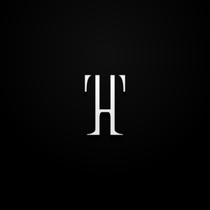 The Logo Text is Talbot House. (See photo) | Logo Design by toothless99