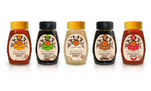 We markets organic & fair trade honey produced by 10,000 African forest beekeepers | Diseño de Etiqueta por MilM