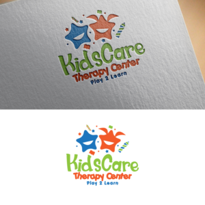 Text should include 2 elements: 1) Business Name: KidsCare Therapy Center 2) Business Slogan: Play 2 Learn | Logo Design by Graphic Bricks