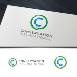Likely the name or initials of the organization. | Logo-Design von WooW Designs