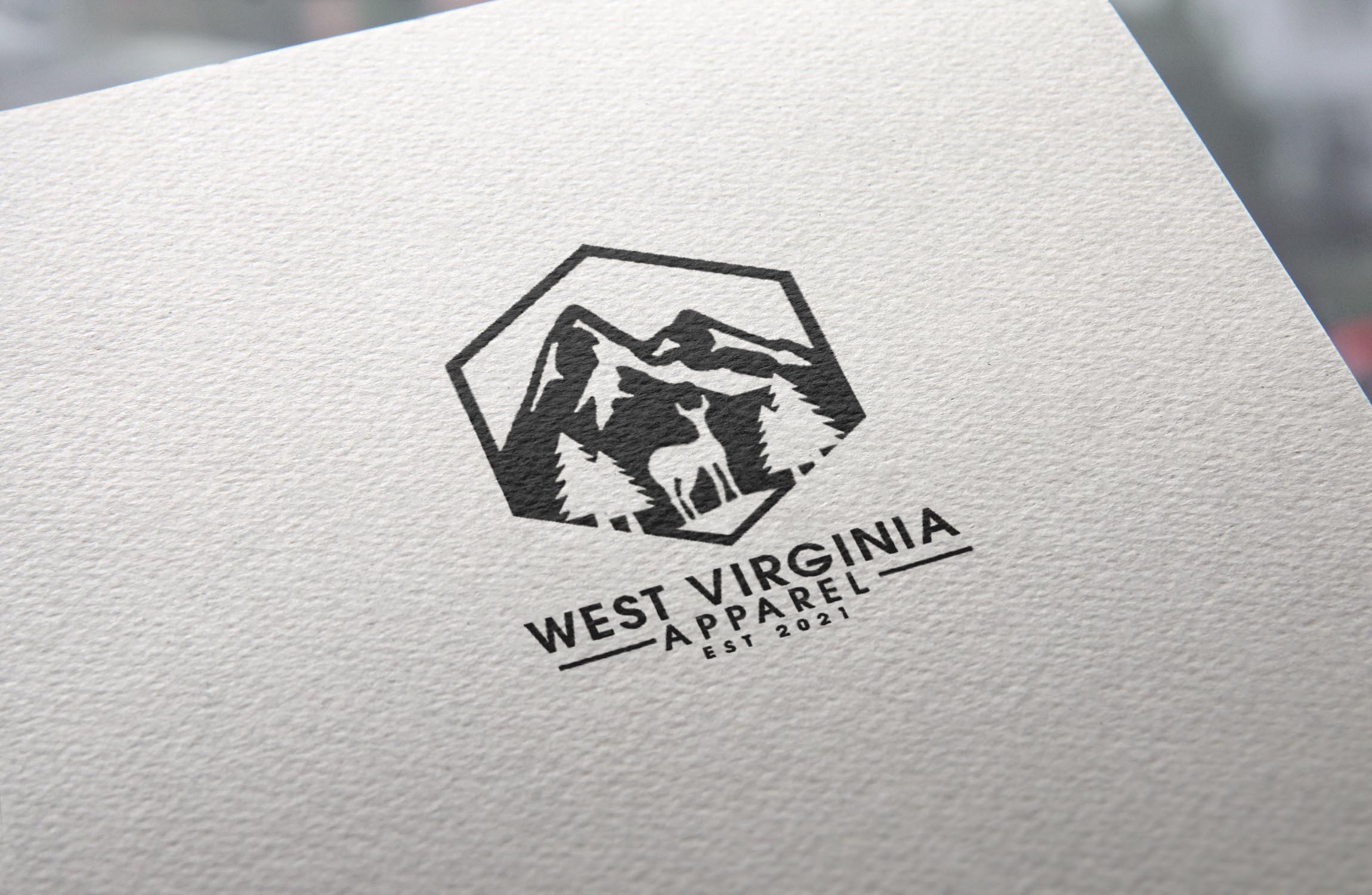 Diseño de Logo por DubaiArts para West Virginia Apparel | Diseño #27419615