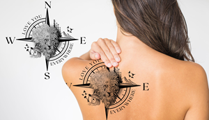 Compass added to lion shoulder tattoo design