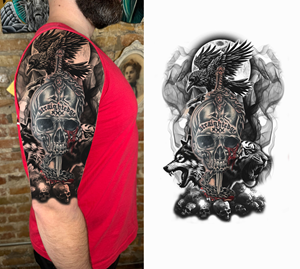 Half sleeve building off original skull tattoo