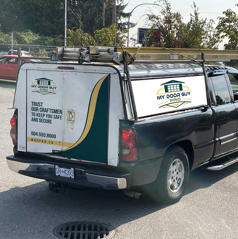Car Wrap Design by YourLogoMaster for My Door Guy Pro Ltd. | Design #35227275