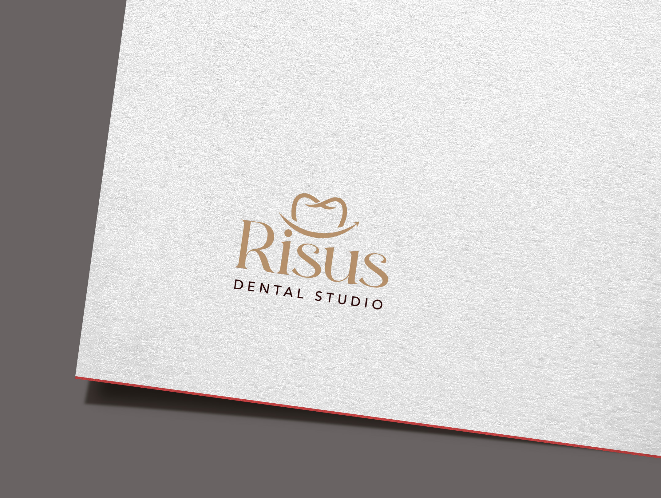 Diseño de Logo por GraphiqueLab para Risus Dental Studio | Diseño #36910170