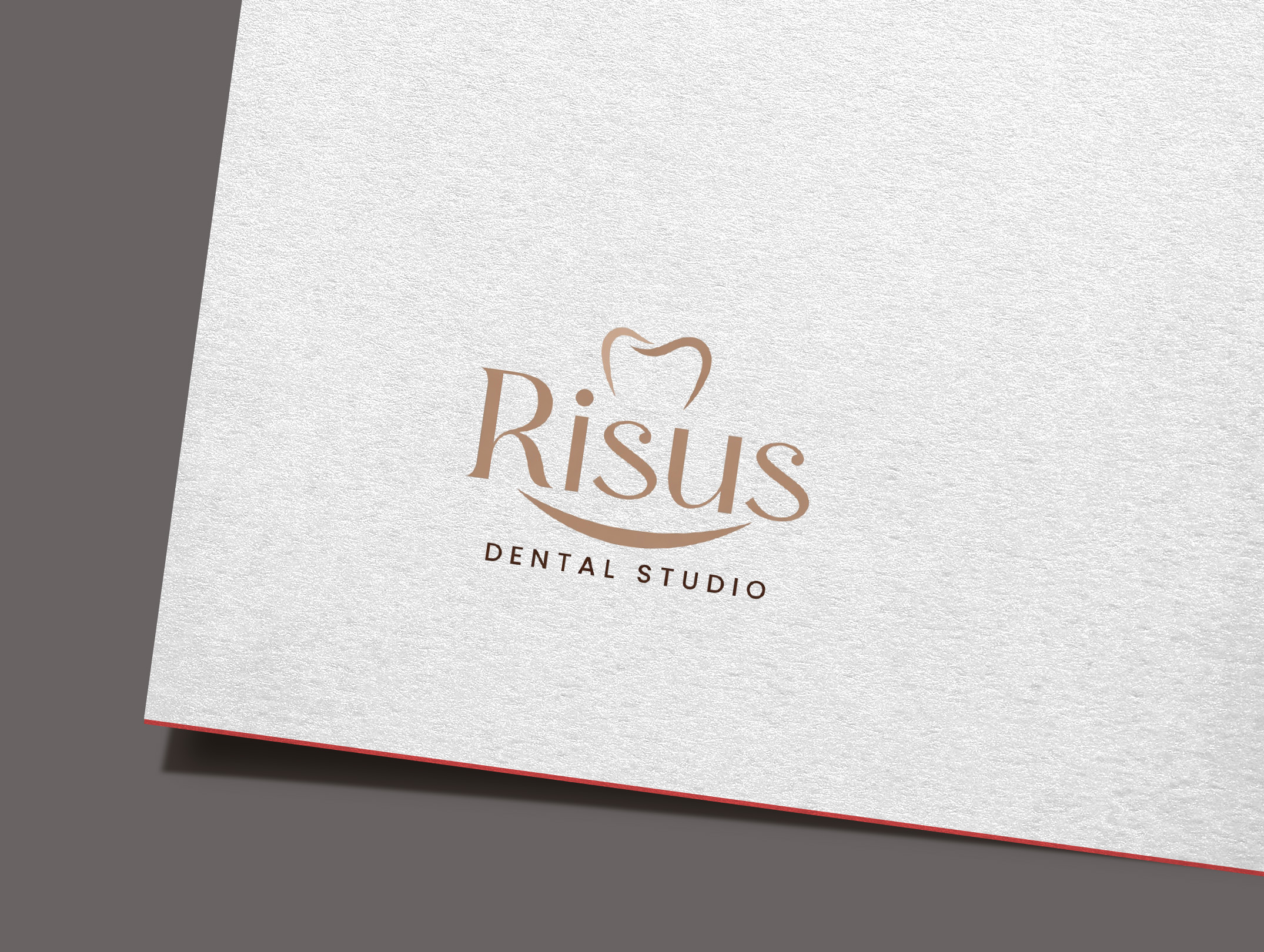 Diseño de Logo por GraphiqueLab para Risus Dental Studio | Diseño #36910172